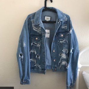 Distressed denim jacket